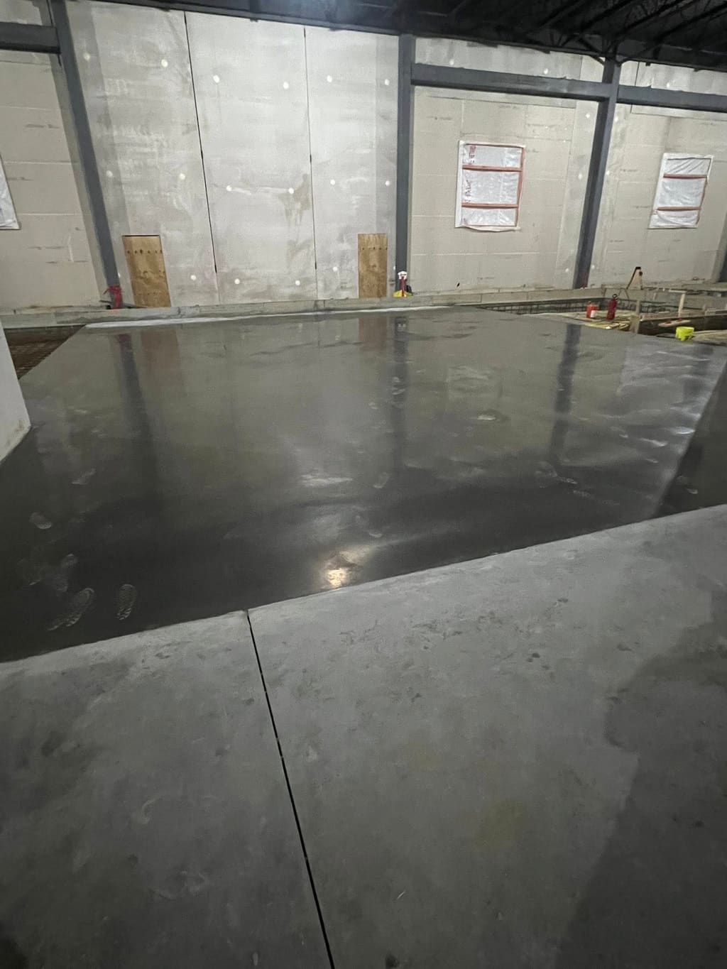 Polished interior concrete slab floor.