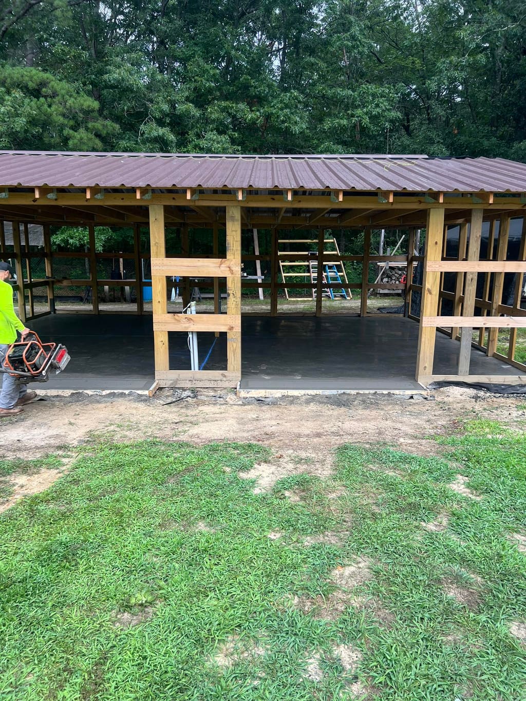 Poured concrete slab for a pole-barn foundation.